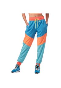 ZUMBA WEAR - Spodnie dresowe fitness w fasonie joggerów Zumba. Kolor: wielokolorowy. Materiał: poliester. Wzór: kolorowy. Sport: fitness #1