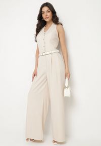 Born2be - Beżowy Kombinezon na Szyję Ozdobiony Guzikami Ellidell. Okazja: na co dzień, na imprezę. Kolor: beżowy. Długość: długie. Wzór: aplikacja. Styl: klasyczny, casual #5