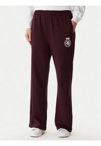 TOMMY HILFIGER - Tommy Hilfiger Spodnie dresowe UW0UW06081 Bordowy Wide Leg. Kolor: czerwony. Materiał: bawełna