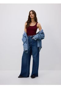 Reserved - Jeansy wide leg z rozdarciami - niebieski. Kolor: niebieski