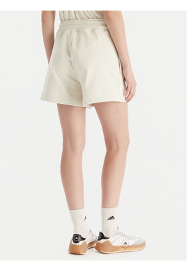 Adidas by Stella McCartney - adidas by Stella McCartney Szorty sportowe True Casuals JX6786 Beżowy Loose Fit. Kolor: beżowy. Materiał: bawełna
