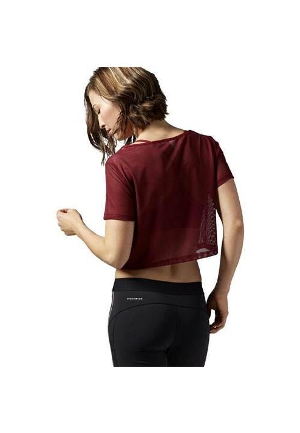 Koszulka sportowa damska Reebok Cardio Mesh Tee. Kolor: czerwony. Materiał: mesh. Długość rękawa: krótki rękaw. Długość: krótkie