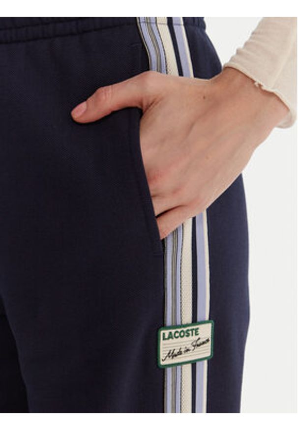 Lacoste Spodnie dresowe XF5250 Granatowy Regular Fit. Kolor: niebieski. Materiał: bawełna