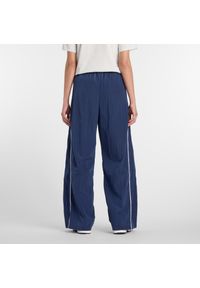 Spodnie damskie New Balance WB61Z1E6NNY – granatowe. Kolor: niebieski. Materiał: tkanina, nylon, materiał #2