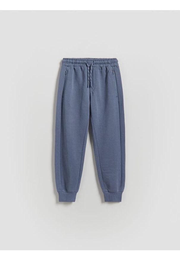 Reserved - Bawełniane joggery - niebieski. Kolor: niebieski. Materiał: bawełna