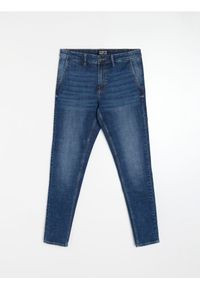 Sinsay - Jeansy chino slim fit - granatowy. Kolor: niebieski. Materiał: jeans