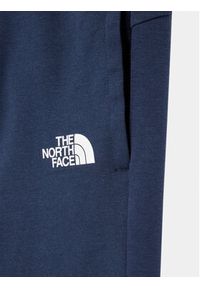 The North Face Spodnie dresowe Slacker NF0A82DS Granatowy Regular Fit. Kolor: niebieski. Materiał: bawełna