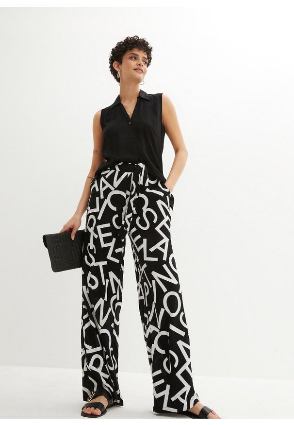 bonprix - Spodnie Marlena z wiązanym paskiem. Kolor: czarny. Wzór: nadruk
