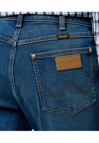 Wrangler Jeansy 112373028 Niebieski Bootcut Fit. Kolor: niebieski