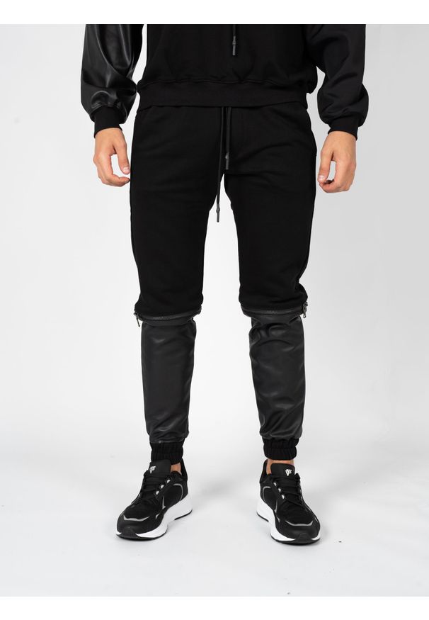Les Hommes Spodnie "Jogshort" | LBJ4001700F | Mężczyzna | Czarny. Okazja: na co dzień. Kolor: czarny. Materiał: poliester, bawełna. Styl: elegancki, casual