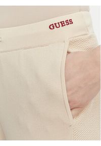 Guess Spodnie dresowe V6GB06 Z0651 Beżowy Wide Leg. Kolor: beżowy. Materiał: syntetyk #3