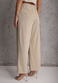 Renee - Beżowe Szerokie Spodnie Wiskozą Bawełną i Elastyczną Talią ze Sznurkiem Arkinae. Okazja: na co dzień. Stan: podwyższony. Kolor: beżowy. Materiał: wiskoza, bawełna. Wzór: aplikacja. Styl: casual #4
