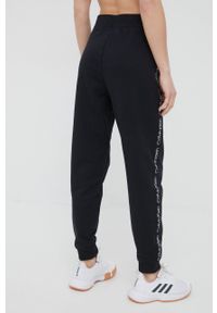 Calvin Klein Performance spodnie dresowe Active Icon damskie kolor czarny z aplikacją. Kolor: czarny. Materiał: dresówka. Wzór: aplikacja #2