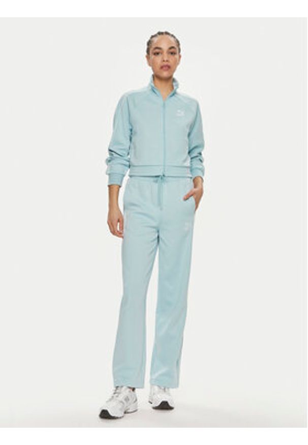 Puma Spodnie dresowe T7 624212 Niebieski Relaxed Fit. Kolor: niebieski. Materiał: bawełna, syntetyk