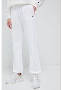 Champion spodnie dresowe kolor biały gładkie. Kolor: biały. Materiał: dresówka. Wzór: gładki #1