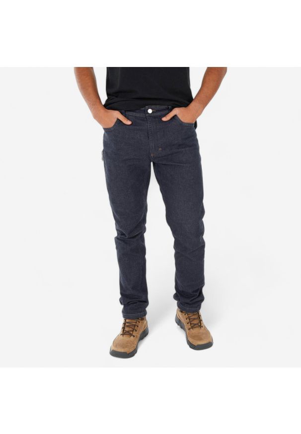 quechua - Spodnie turystyczne męskie Quechua NH500 jeans. Kolor: niebieski, czarny, wielokolorowy. Materiał: elastan, bawełna, poliester, materiał. Sezon: lato. Sport: turystyka piesza