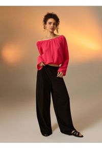 Sinsay - Wiskozowe spodnie wide leg - czarny. Kolor: czarny. Materiał: wiskoza