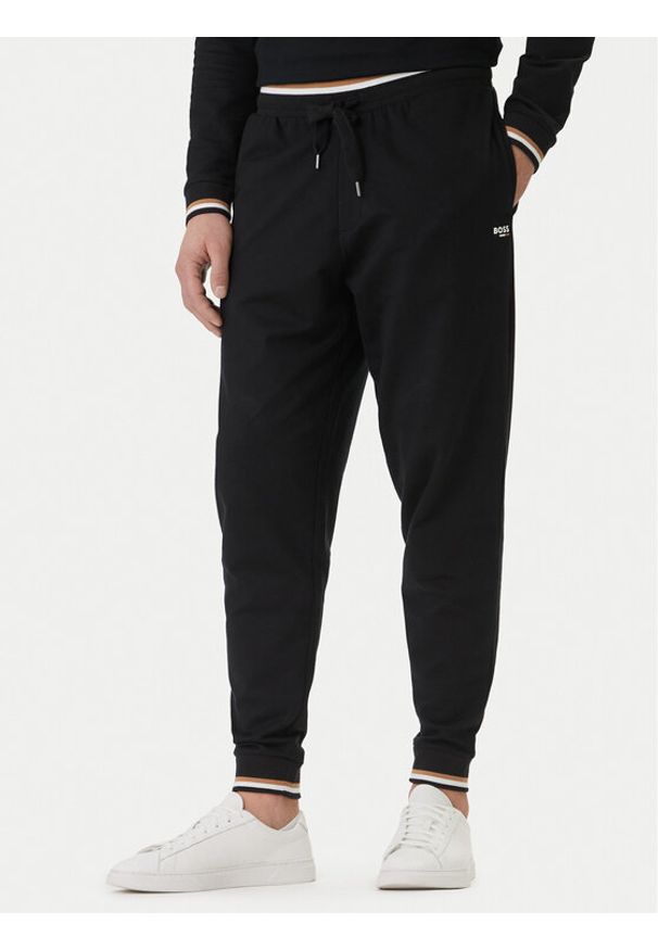 BOSS Spodnie dresowe Iconic 50554830 Czarny Regular Fit. Kolor: czarny. Materiał: bawełna