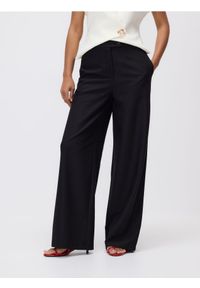 Reserved - Spodnie z szerokimi nogawkami - czarny. Kolor: czarny. Materiał: wiskoza, tkanina #1