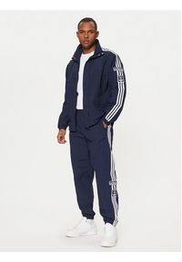 Adidas - adidas Spodnie dresowe Adibreak JD4258 Granatowy Loose Fit. Kolor: niebieski. Materiał: syntetyk
