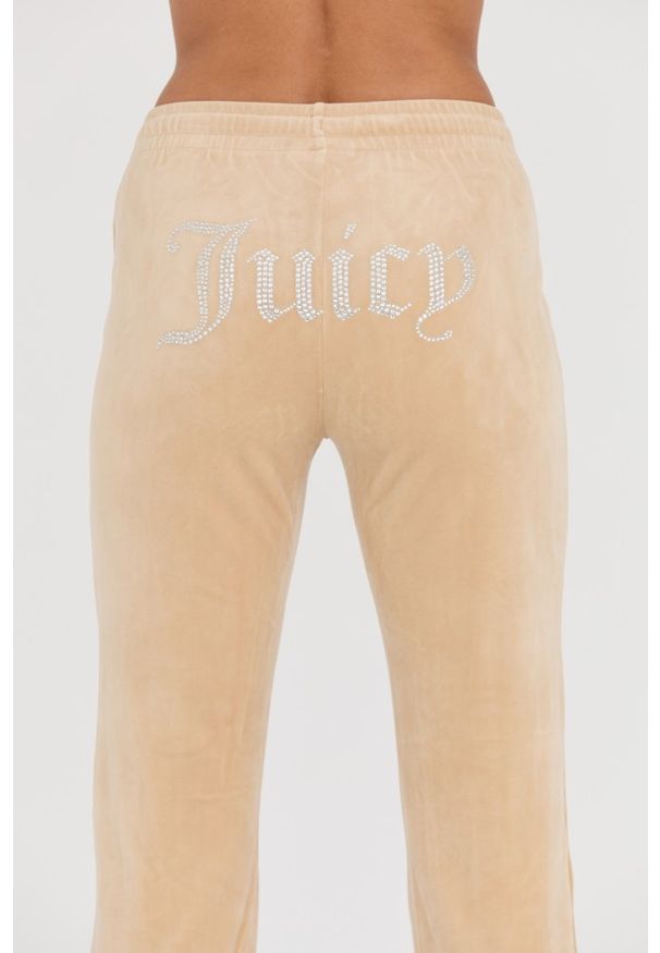 Juicy Couture - JUICY COUTURE Beżowe damskie spodnie dresowe Tina Track Pants, Rozmiar L. Kolor: beżowy. Materiał: dresówka