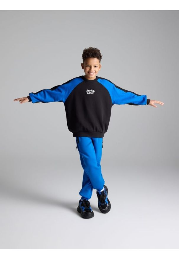 Reserved - Bluza oversize - czarny. Kolor: czarny. Materiał: bawełna, dzianina