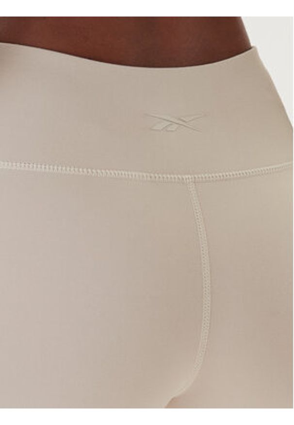 Reebok Legginsy RK25311CCW Beżowy Slim Fit. Kolor: beżowy. Materiał: syntetyk