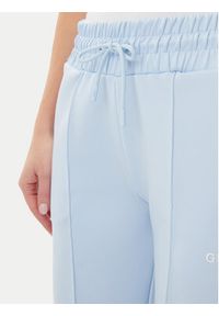 Guess Spodnie dresowe V5GB12 KCRU2 Błękitny Regular Fit. Kolor: niebieski. Materiał: syntetyk #5