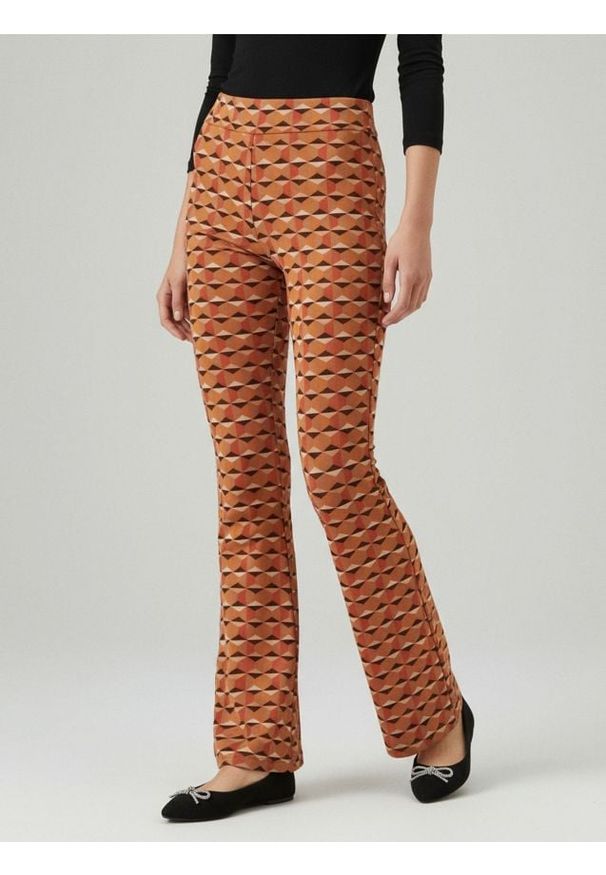 Sinsay - Legginsy flare ze wzorem geometrycznym - wielobarwny. Wzór: geometria