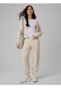 4f - 4F Spodnie dresowe z modalem joggery damskie - beżowe S. Stan: podwyższony. Kolor: beżowy. Materiał: dresówka. Długość: do kostek. Wzór: gładki #1