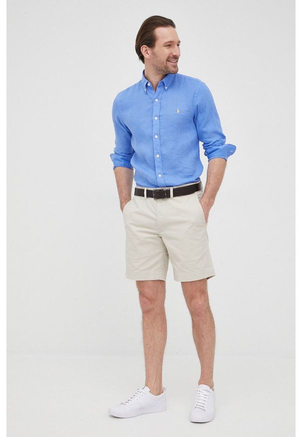 Polo Ralph Lauren koszula lniana męska slim z kołnierzykiem button-down. Typ kołnierza: polo, button down. Kolor: niebieski. Materiał: len. Długość rękawa: długi rękaw. Długość: długie. Wzór: gładki