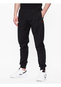 Ellesse Spodnie dresowe Bertoni SHR04351 Czarny Regular Fit. Kolor: czarny. Materiał: bawełna, syntetyk