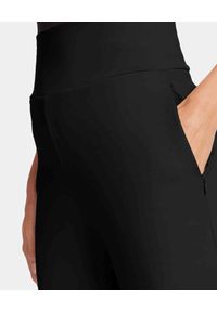 Wolford - WOLFORD - Czarne spodnie Athene. Kolor: czarny. Materiał: materiał, elastan, wiskoza #4
