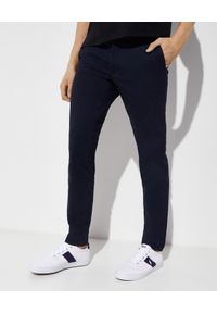 Ralph Lauren - RALPH LAUREN - Granatowe spodnie Chino Slim. Okazja: na co dzień. Kolor: niebieski. Materiał: bawełna. Wzór: aplikacja, napisy. Styl: klasyczny, casual, elegancki #1