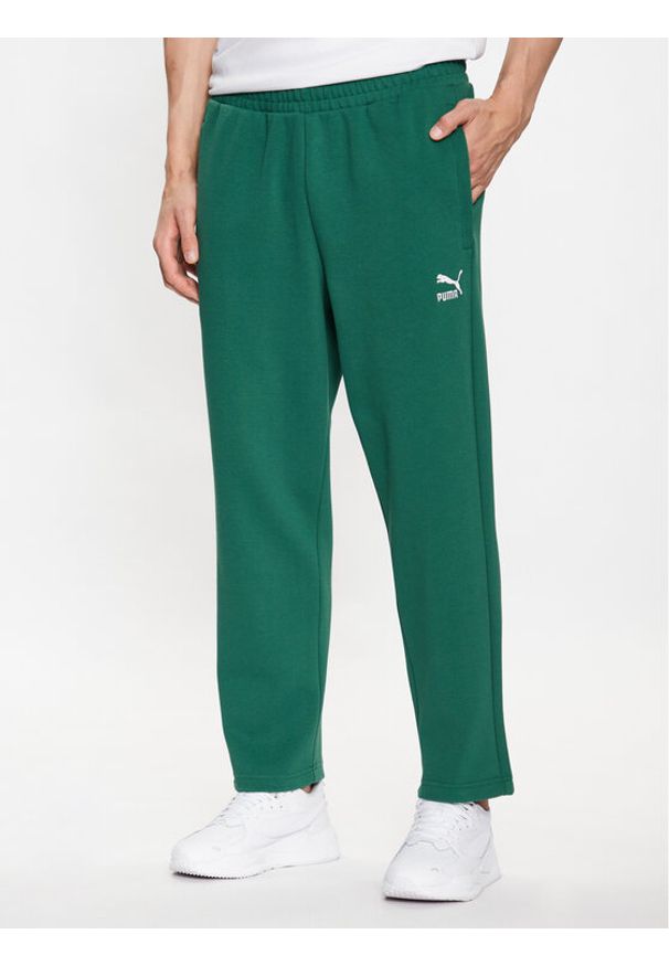 Spodnie dresowe Puma. Kolor: zielony. Materiał: dresówka
