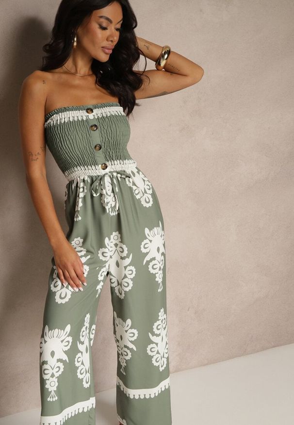 Renee - Ciemnobeżowy Kombinezon Bandeau Ozdobiony Ornamentnym Motywem i Guzikami Liravessa. Okazja: na co dzień. Kolor: beżowy. Wzór: aplikacja. Styl: elegancki, casual