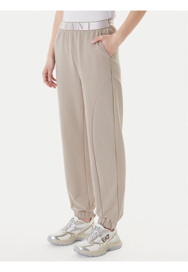 EA7 Emporio Armani Spodnie dresowe 7W001154 AF12501 U6225 Beżowy Regular Fit. Kolor: beżowy. Materiał: syntetyk