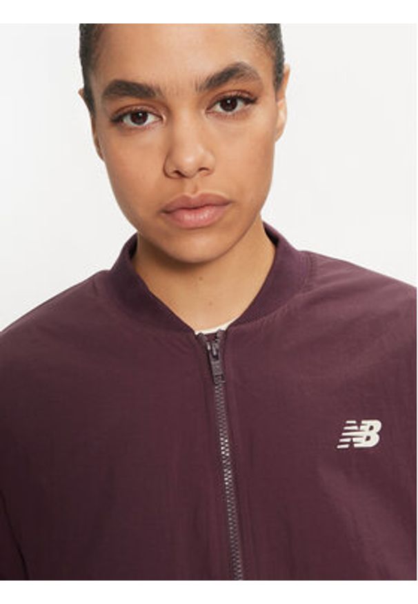 New Balance Kurtka bomber WJ43511 Brązowy Regular Fit. Kolor: brązowy. Materiał: syntetyk