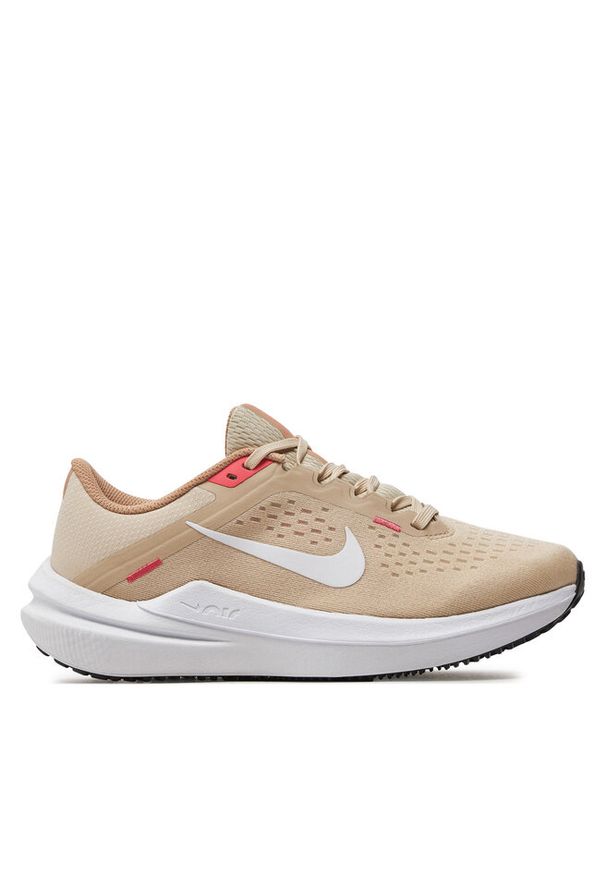 Buty do biegania Nike. Kolor: beżowy