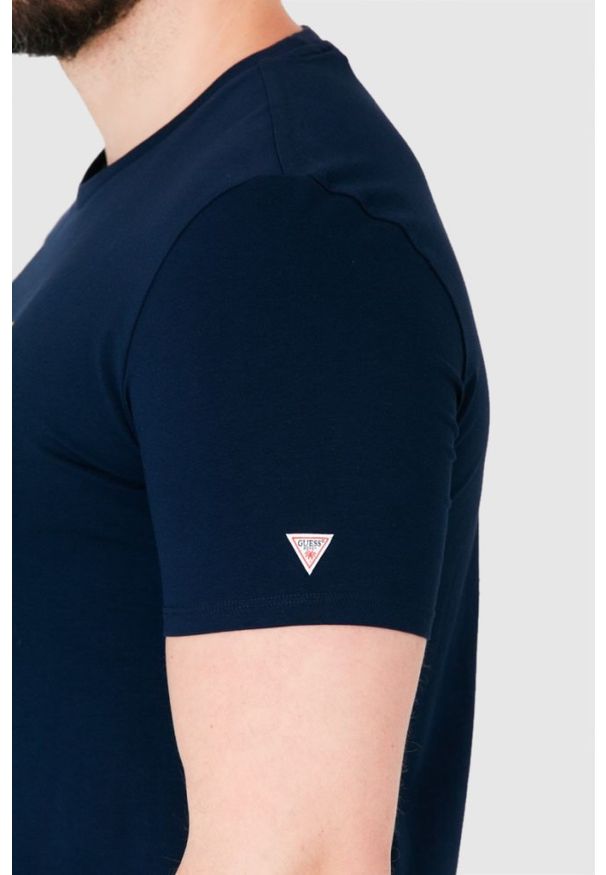 Guess - GUESS Granatowy t-shirt męski beachwear. Kolor: niebieski