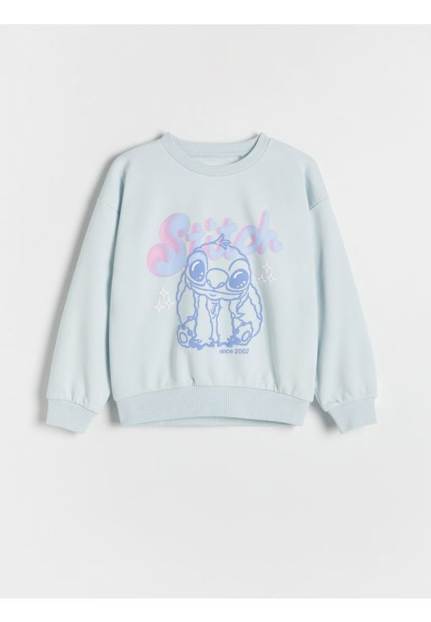 Reserved - Bluza Lilo i Stitch - jasnoniebieski. Kolor: niebieski. Materiał: dzianina, bawełna