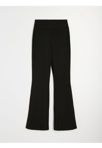 Sinsay - Sportowe legginsy flare Active - czarny. Kolor: czarny. Styl: sportowy #1