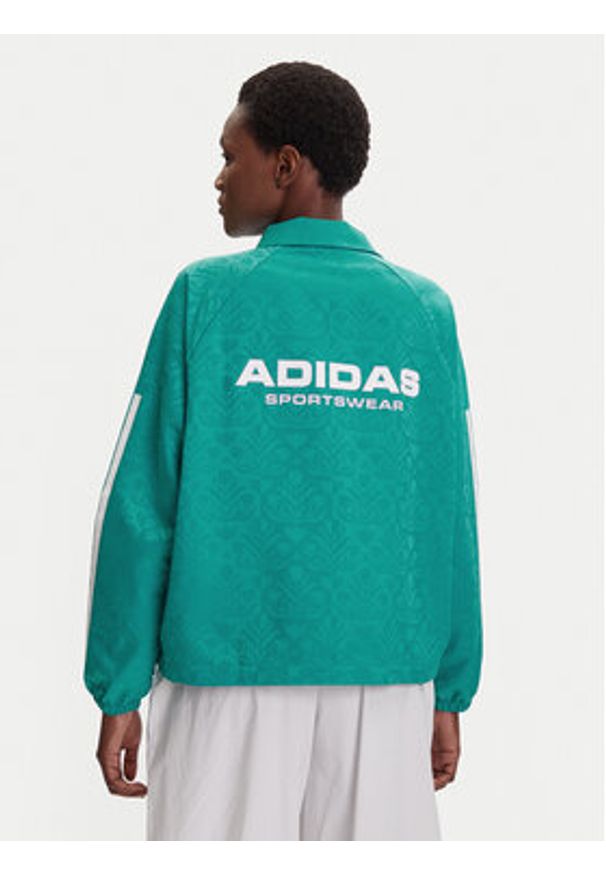 Adidas - adidas Kurtka przejściowa Tiro x Common Goal Coaches JL9204 Turkusowy Loose Fit. Kolor: turkusowy. Materiał: syntetyk