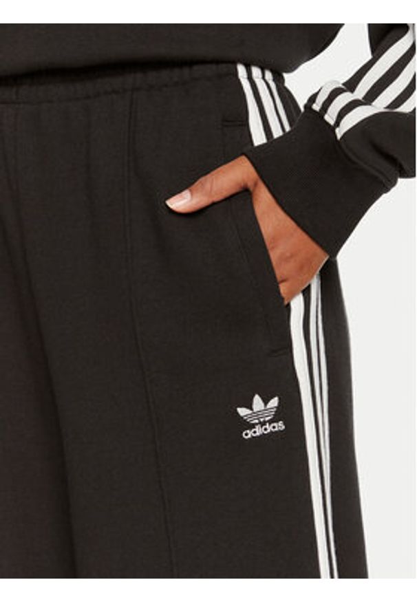 Adidas - adidas Spodnie dresowe 3-Stripes IY7255 Czarny Loose Fit. Kolor: czarny. Materiał: bawełna
