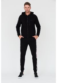 MOSCHINO Czarne męskie spodnie dresowe z lampasami, Rozmiar L. Kolor: czarny. Materiał: dresówka #3