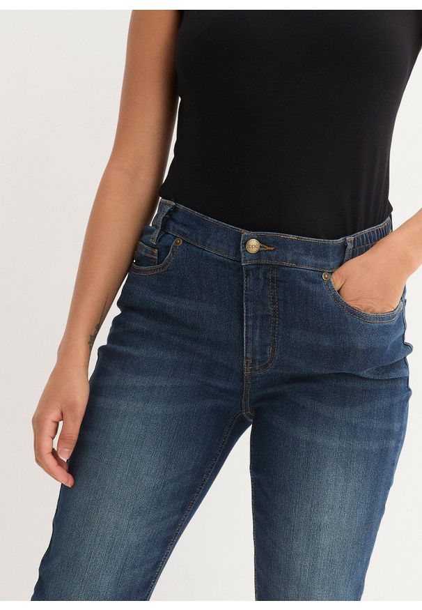 bonprix - Dżinsy o kroju skinny fit, mid waist, z wygodnym paskiem. Kolor: niebieski