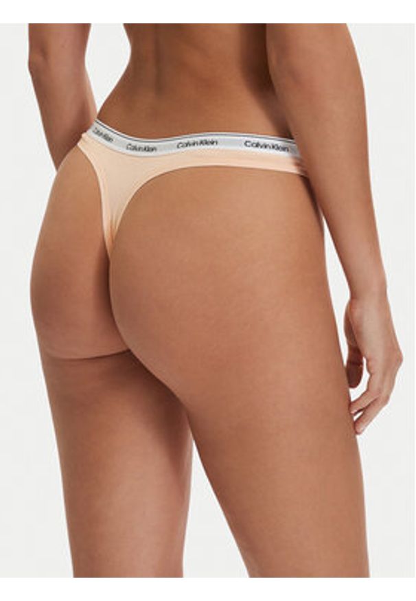 Calvin Klein Underwear Stringi 000QD5043E Pomarańczowy. Kolor: pomarańczowy. Materiał: bawełna