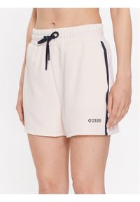 Guess Szorty sportowe Signature V3GD00 KBO62 Różowy Loose Fit. Kolor: różowy. Materiał: syntetyk