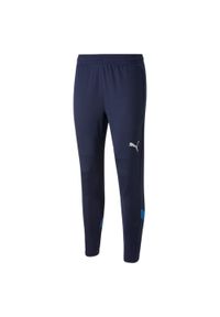 Puma - Spodnie treningowe Italie 2022. Kolor: niebieski. Materiał: materiał. Sport: piłka nożna #1