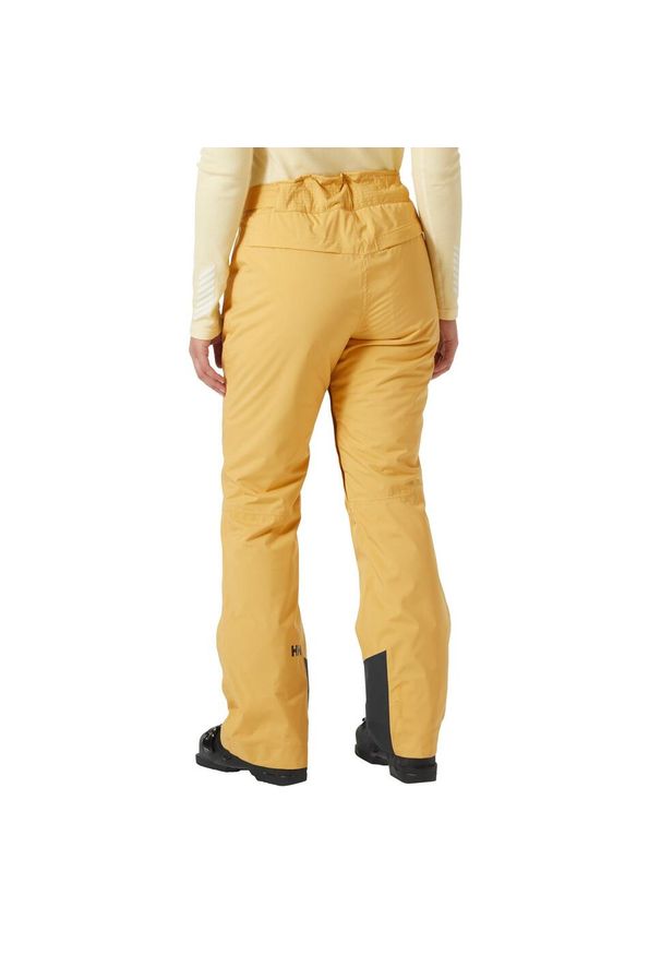 Spodnie damskie Helly Hansen Legendary Insulated. Kolor: beżowy, wielokolorowy, brązowy. Sezon: zima. Sport: narciarstwo